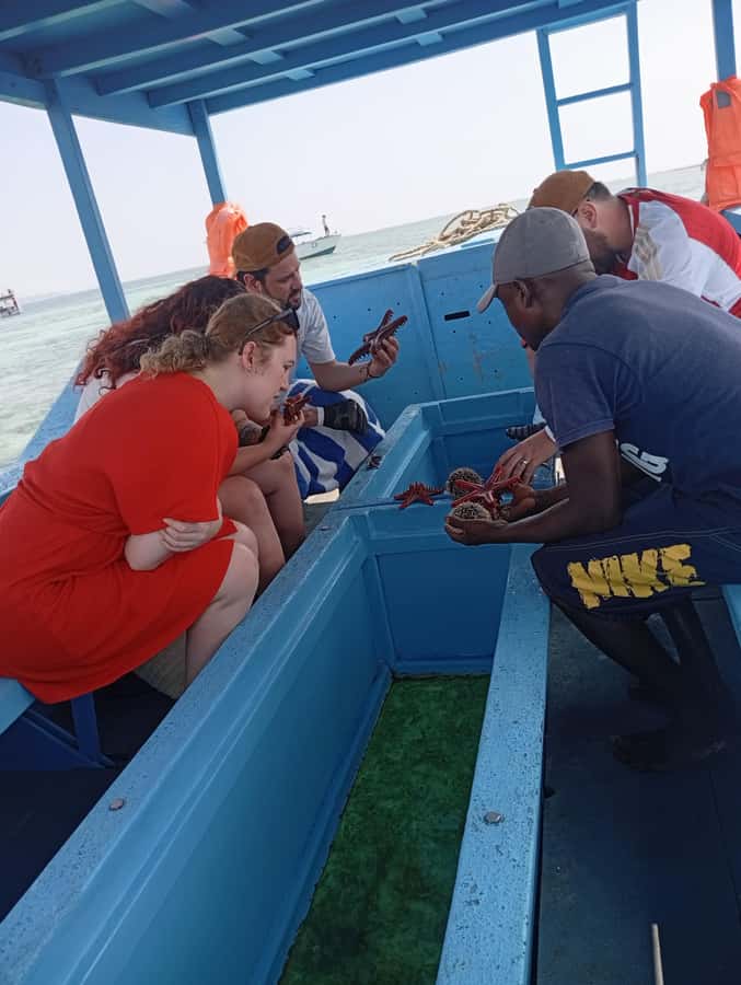 Diani Beach: Glass-Bottom Boat Cruise to Robinson Island - The safety briefing and short cruise out
