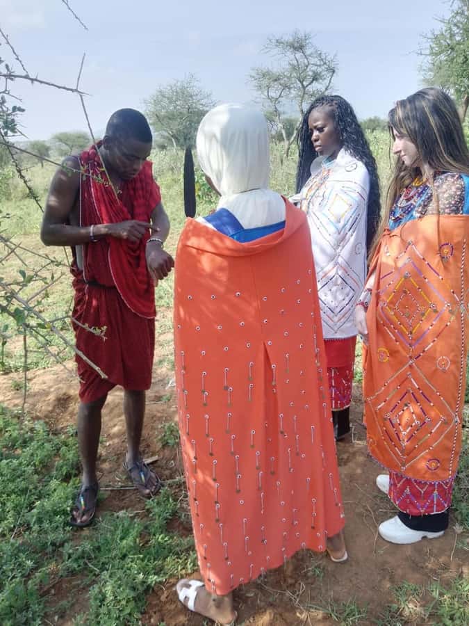 From Nairobi: Masai Tribe Village Visit - Learning to milk goats