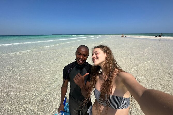 Full Day Dolphin Watching with Snorkeling in Wasini - Weather, swimming, and practical preparation