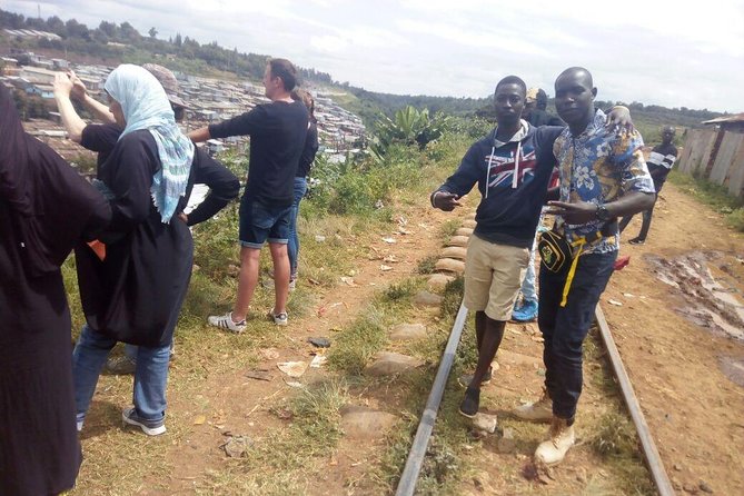 Full Day Kibera Slum Tour - Riding a matatu through Nairobi