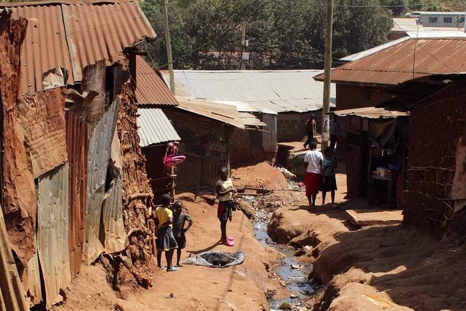 Kibera Chocolate City Tour - Walking beside Kibera’s historic railway