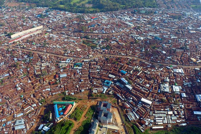 Kibera Slum Guided Tour from Nairobi - Walking from Bombolulu stage into Kibera