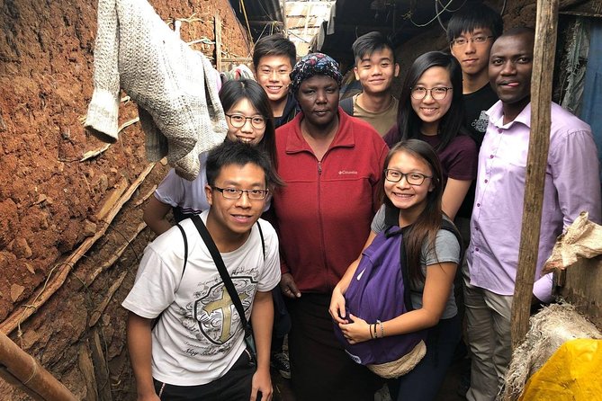 Memorable Daily KIBERA Slums/Toi Market Tour with Locals (2 hours) - Entering Kibera with a guide who knows the community