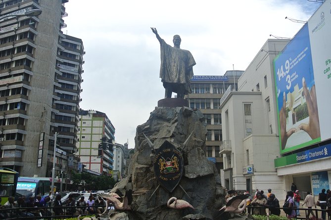 Private Nairobi City Full Day Tour - Reaching the KICC rooftop