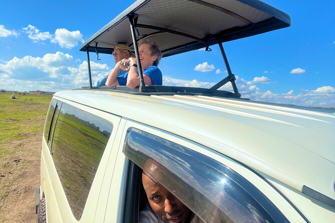 Safari In Nairobi Kenya National Park Half day Tour - The open-roof van and private group setup